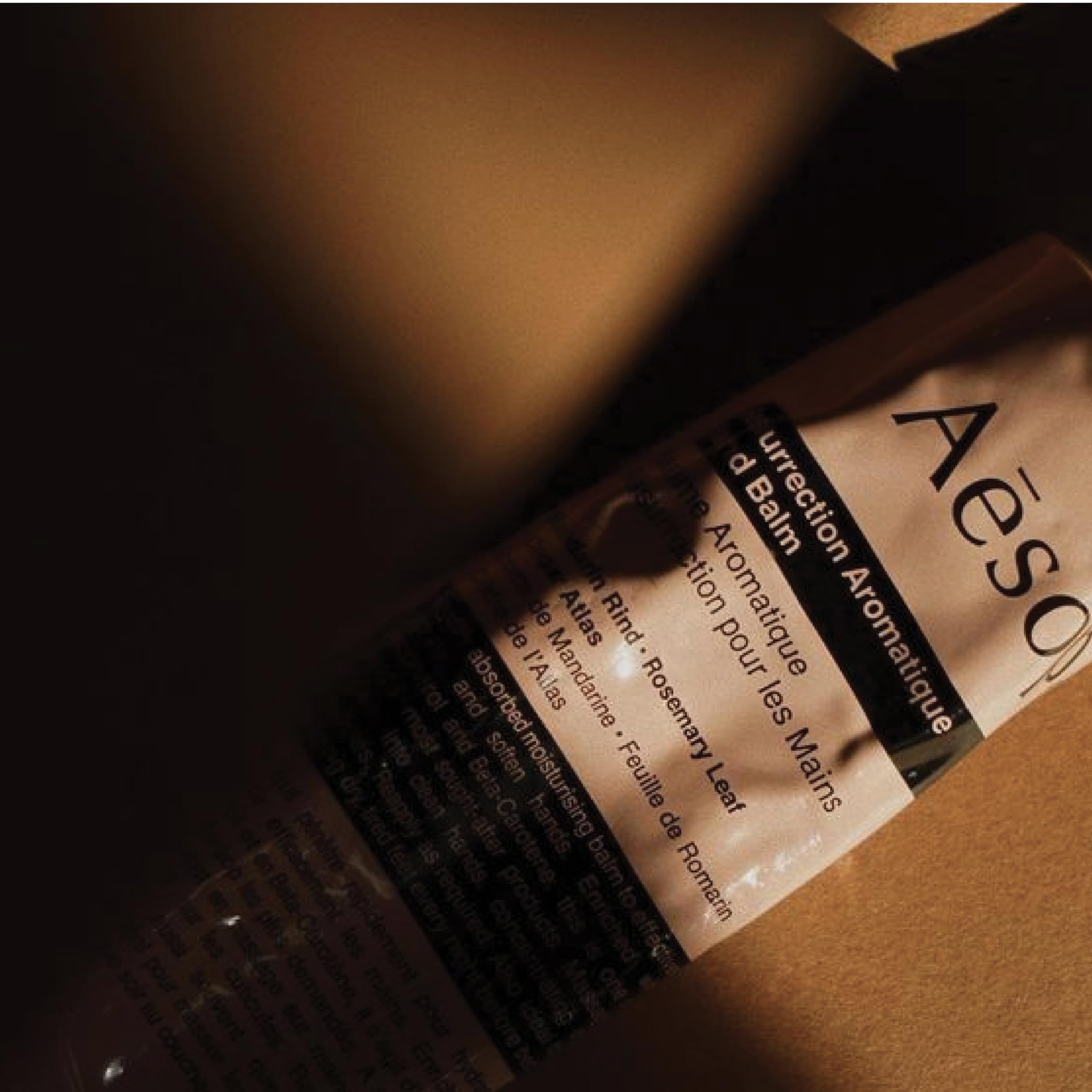 Aesop Resurrection Hand Balm ingredients include mandarin rind, rosemary leaf, cedar atlas.