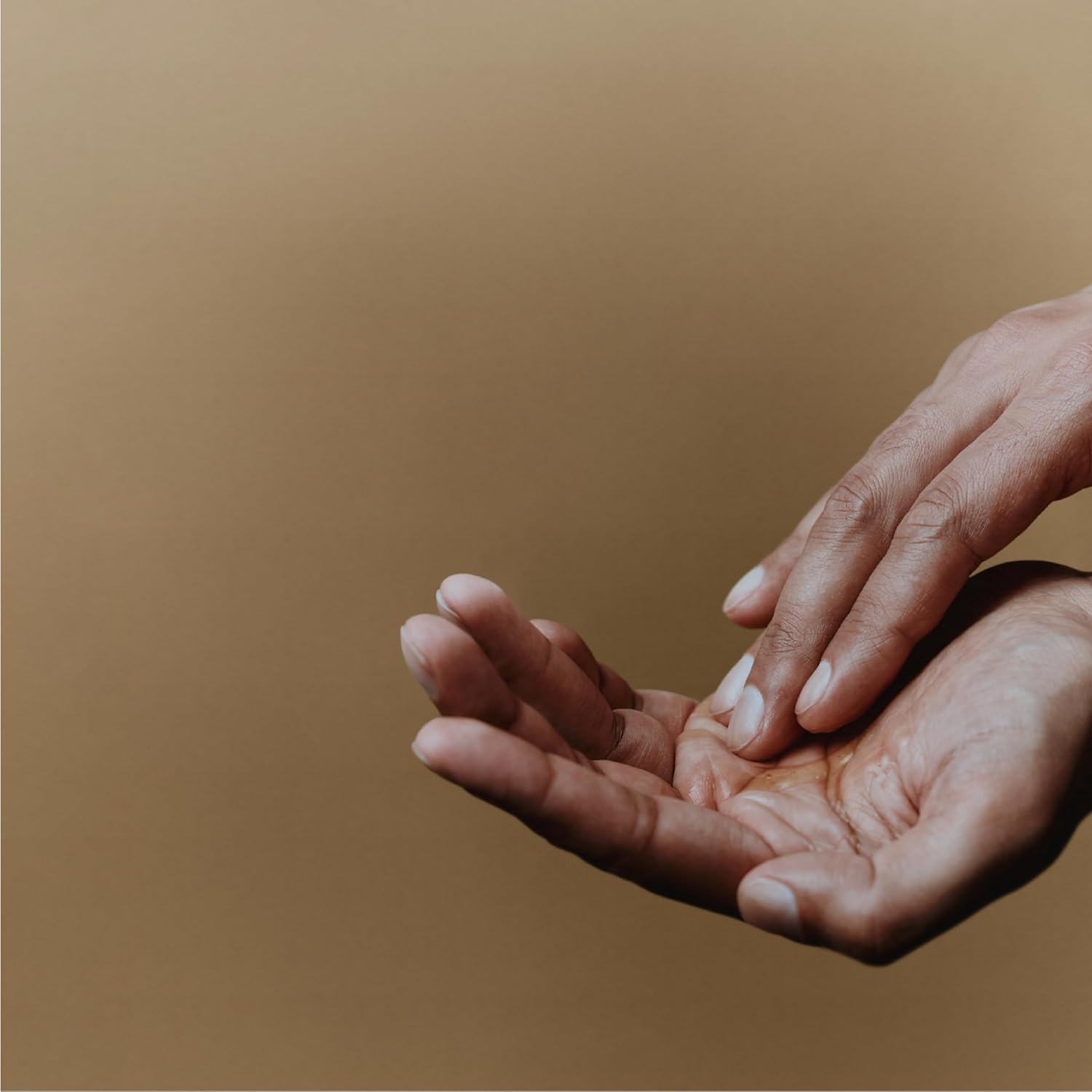 Travel-friendly Reverence Aromatique Hand Balm bottle close-up