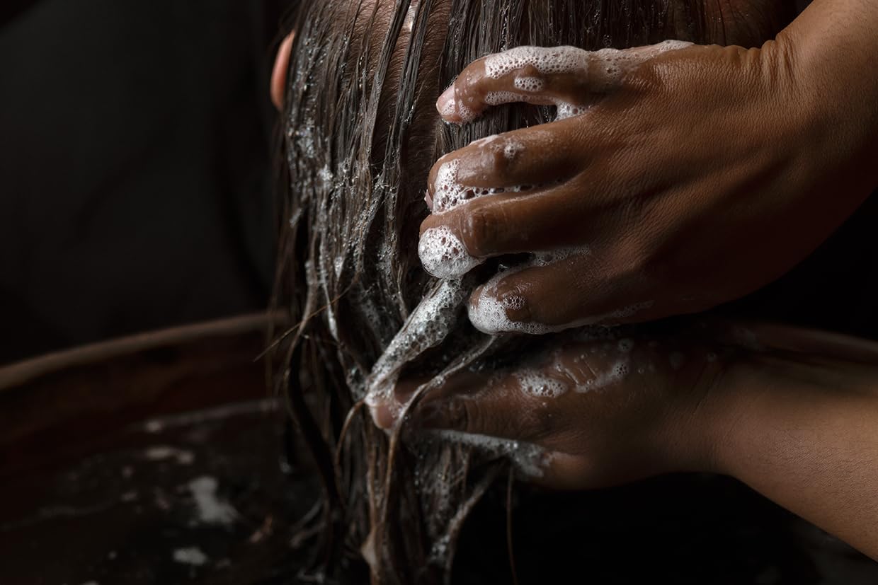 Aesop shampoo image hints at citrus-earthy-woody aroma profile.