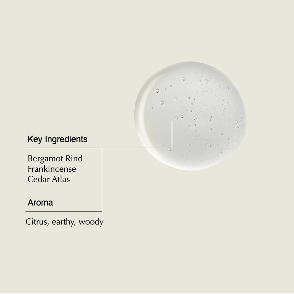 Aesop shampoo bottle highlighting cedar atlas for balanced, woody scent.