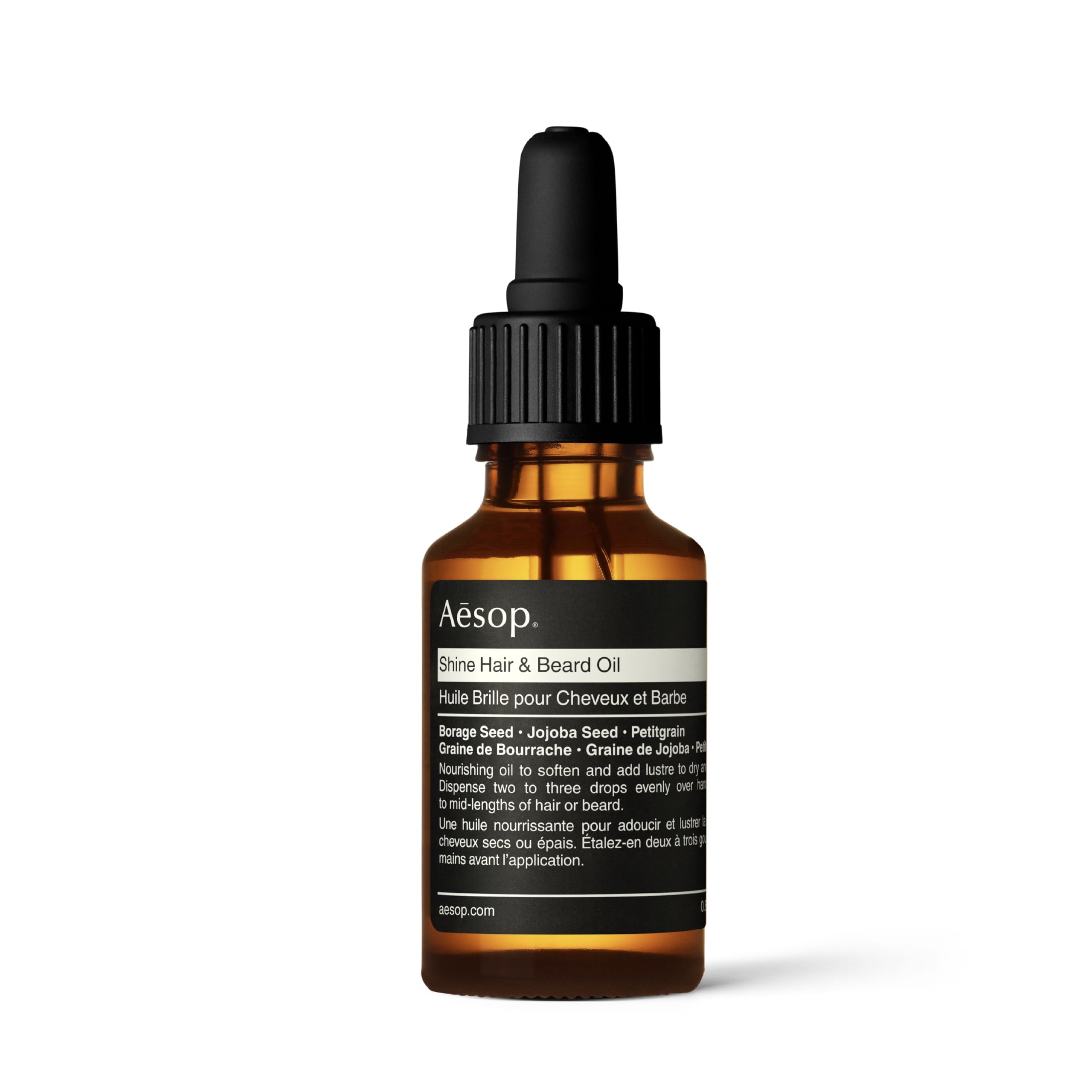 Aesop Shine Hair and Beard Oil bottle delivers silicone-free moisture for smoother texture.