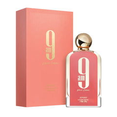 Afnan 9 AM Pour Femme fruity heart image showcases black currant and raspberry for elegance.