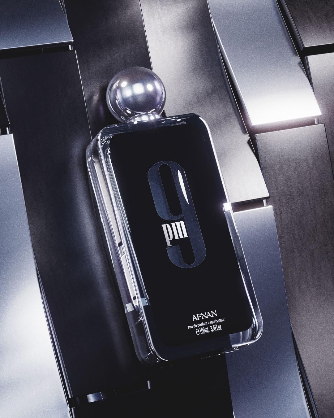 Afnan 9 PM for Men retail display, premium fragrance experience.