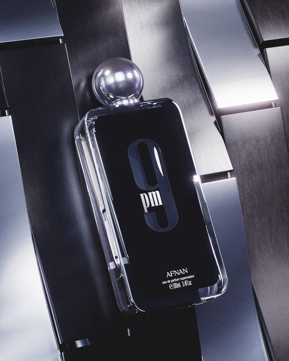 Afnan 9 PM for Men retail display, premium fragrance experience.