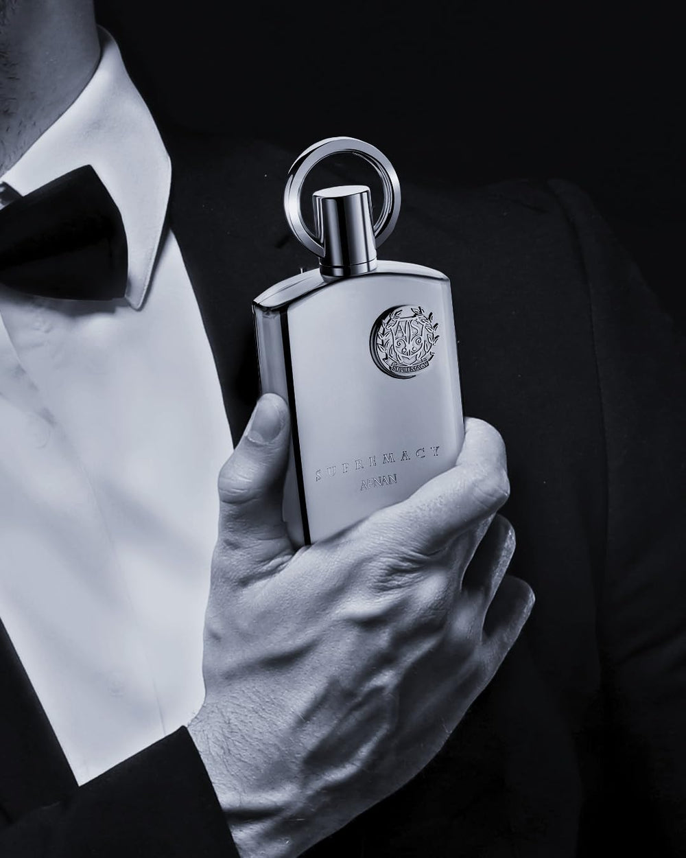 Afnan Supremacy Silver note close-up hints at Apple and Bergamot accents.