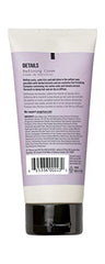 Applying AG Care Curl Details Defining Cream to shape and nourish curls.