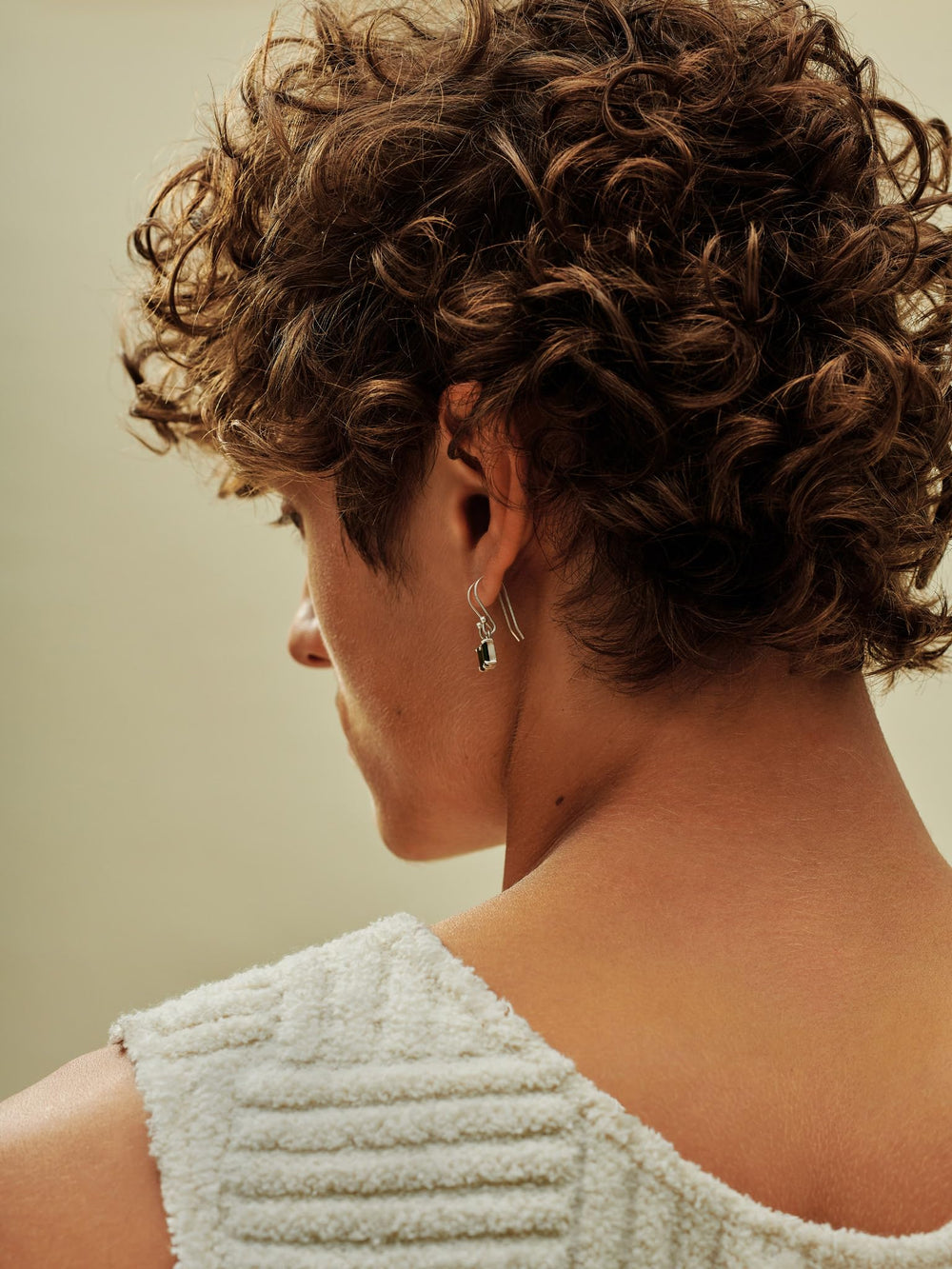 AG Care Curl Trigger Defining Spray adds shine while preserving natural curl texture.