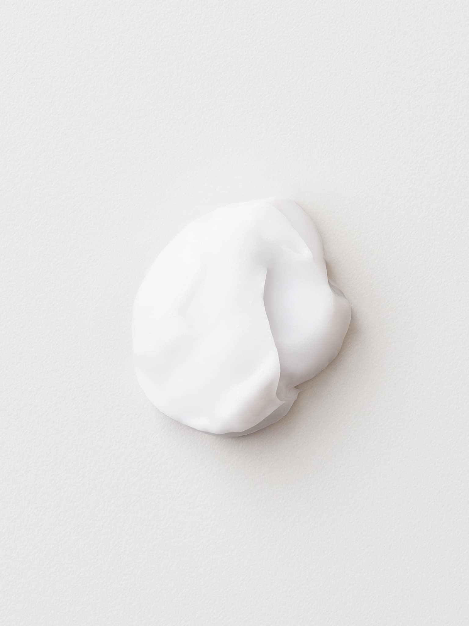 Close-up shows smoother ends after use for healthier-looking hair.