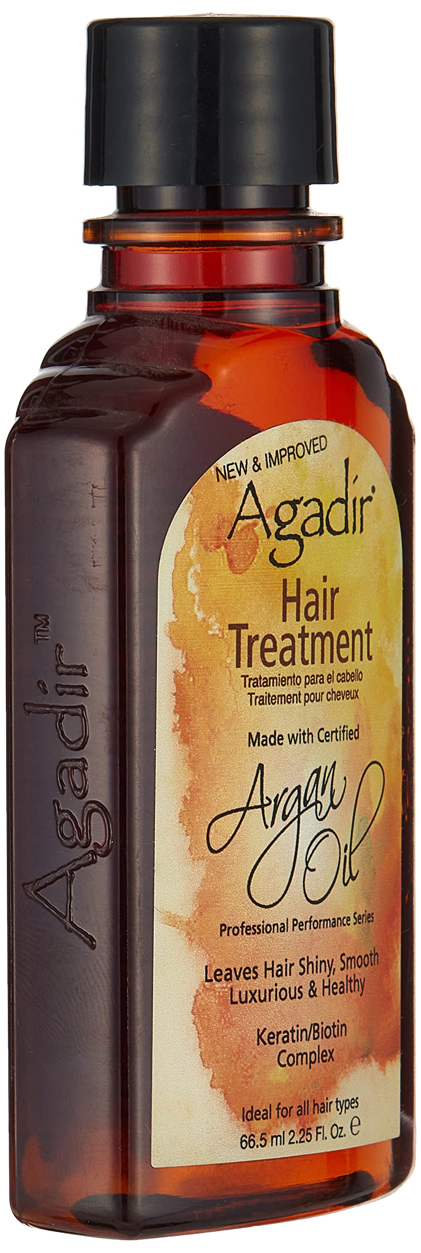 Droplets on hair from Agadir Argan Oil reduce frizz and brittleness.