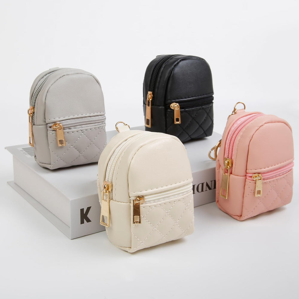AIBFRID PU leather makeup bag in pink stores essentials and adds color to your purse.