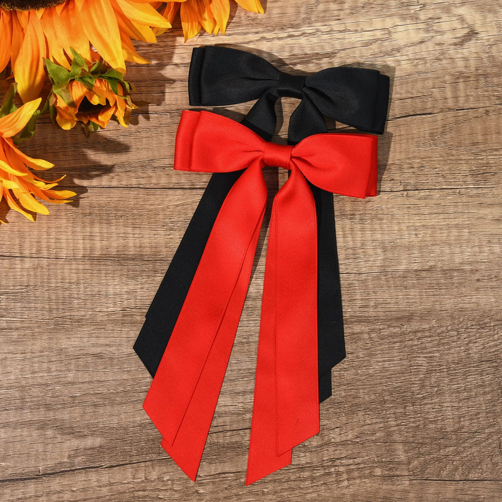 Aileam satin bows on a headband for easy matching outfits.