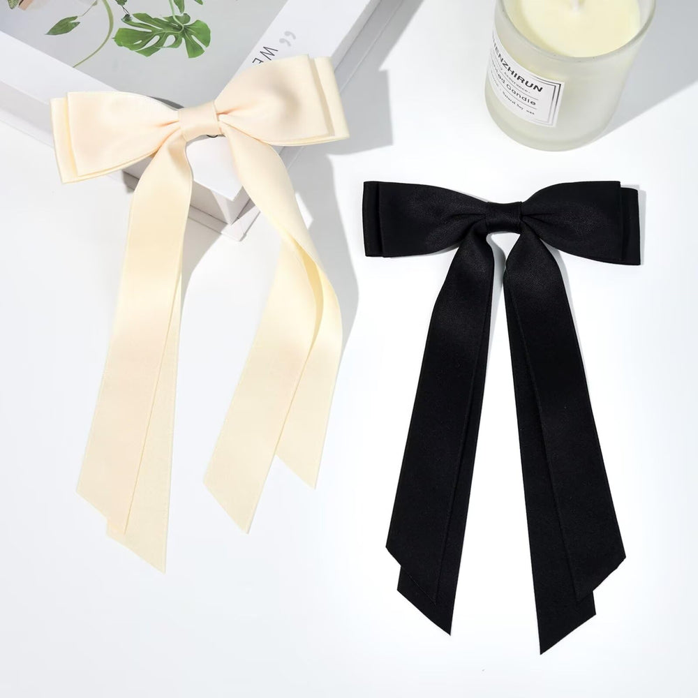 Aileam beige bow close-up showing soft satin finish for gentle styling.