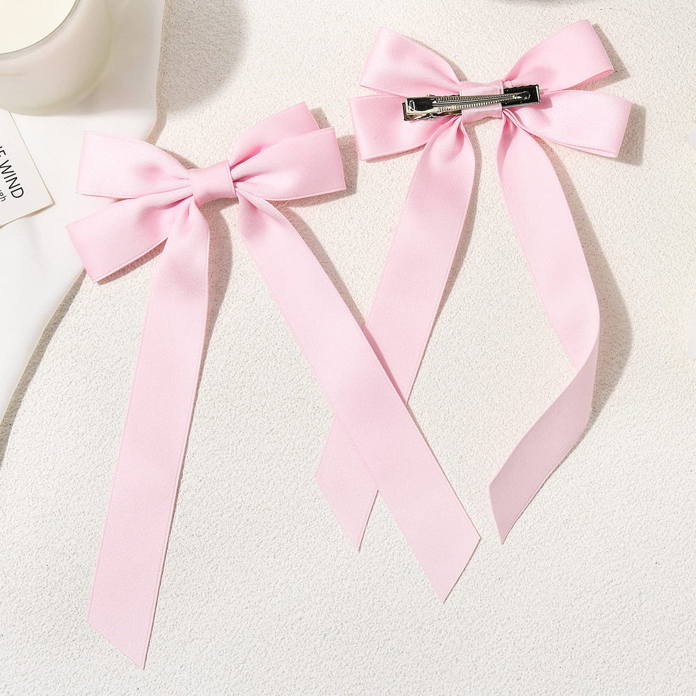 Aileam satin hair bow on ponytail demonstrating easy clip-on style.
