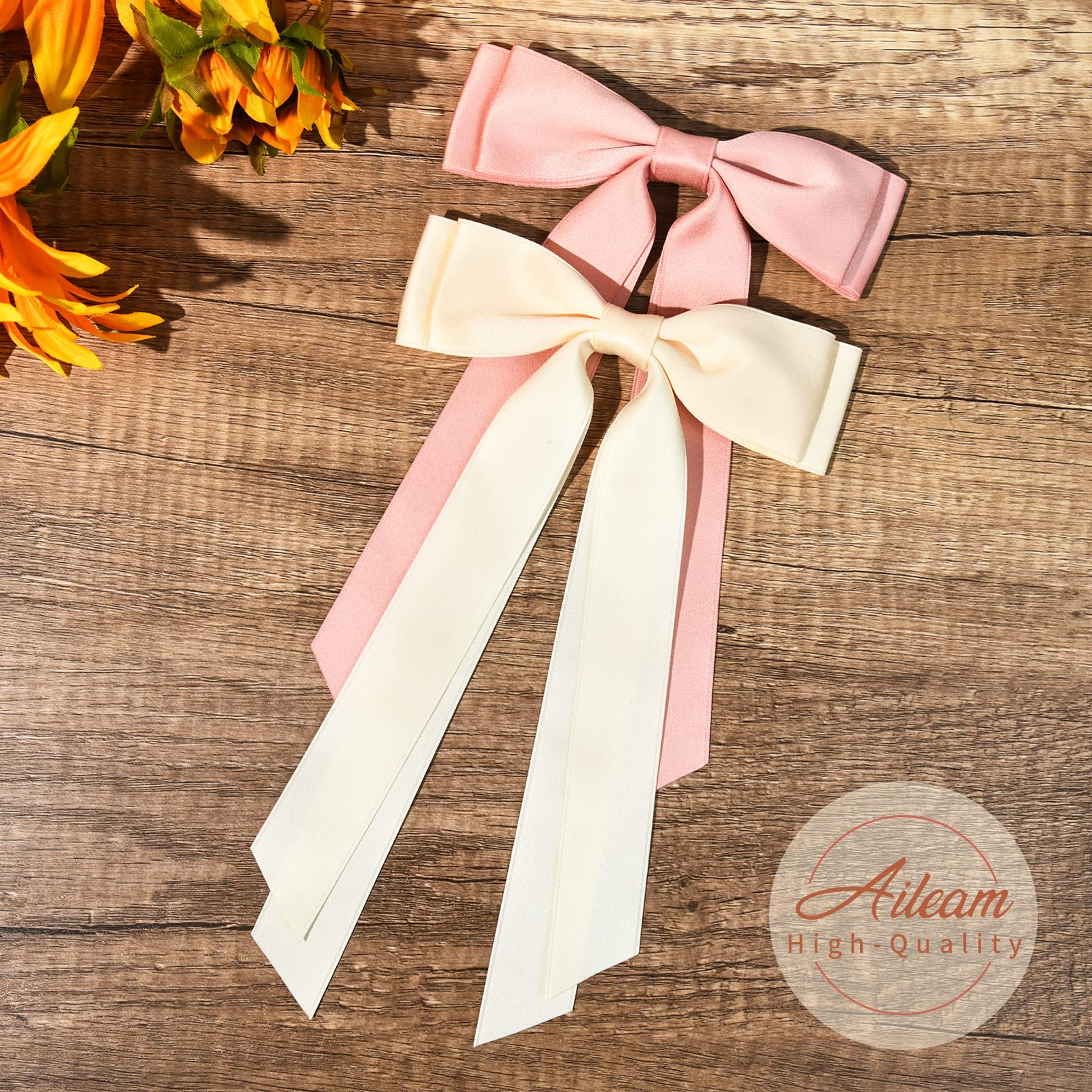 Aileam beige-pink satin bow clipped on hair for subtle shine