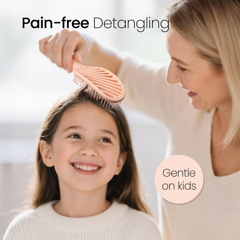 AIMIKE Rose Luxe Detangler Brush detangles wet hair with minimal pulling.