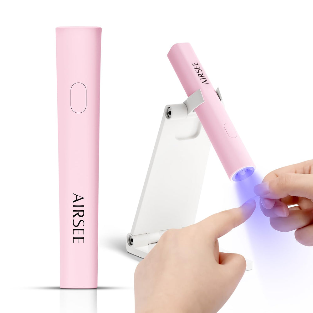 AirSEE mini handheld UV light with stand for fast gel nail curing at home.