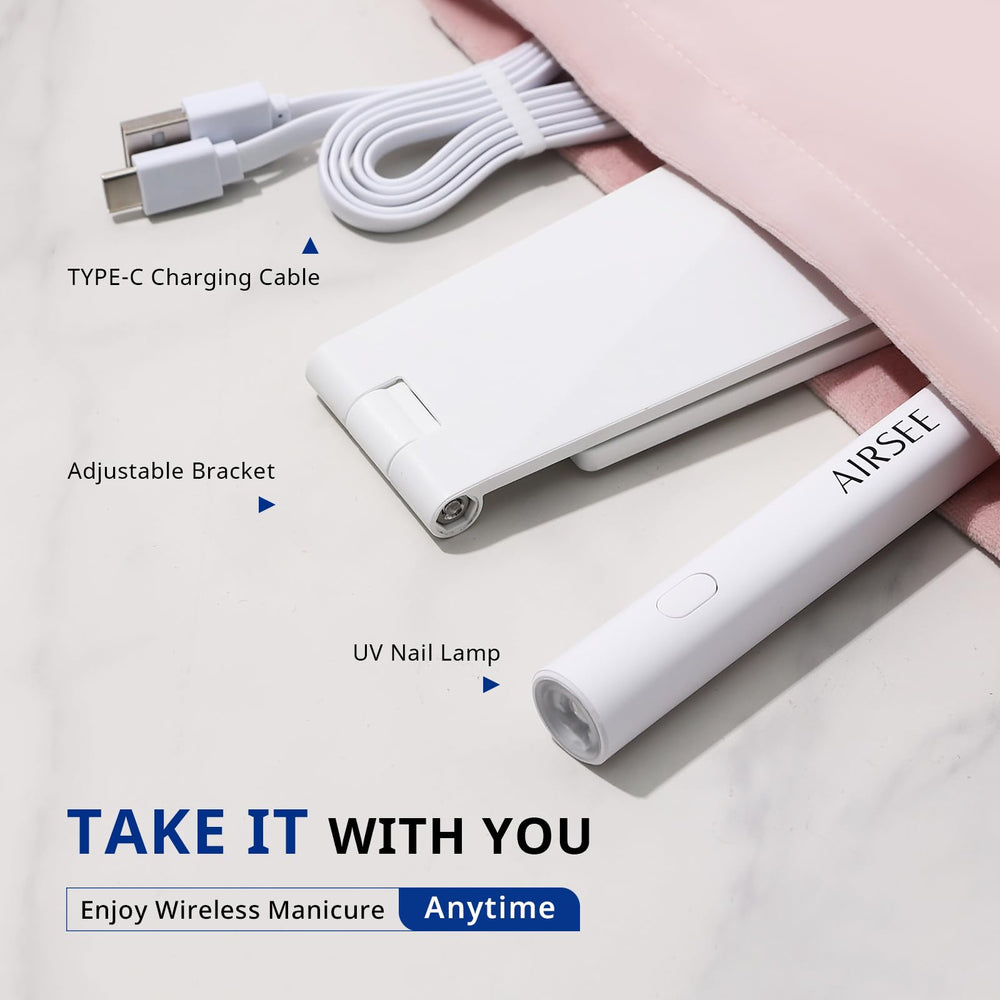 Portable travel-friendly nail lamp in white for on-the-go manicures.