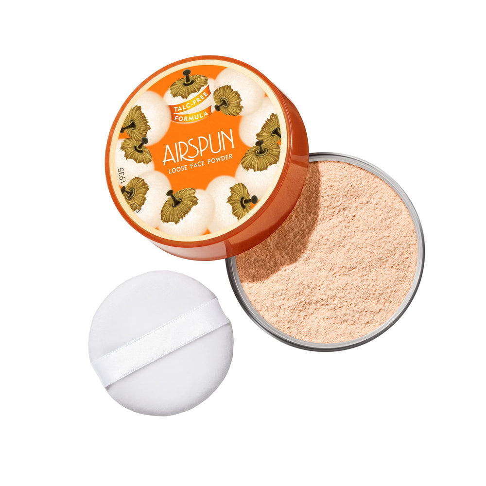 Airspun translucent powder compact during application for seamless setting.