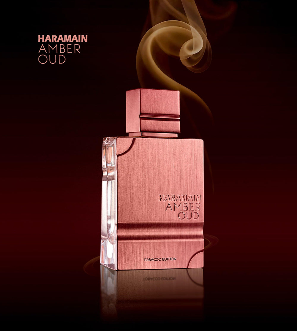 Bottle on table with soft light, evoking elegant evening wear from Al Haramain.