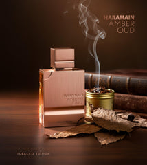 Label details on Al Haramain Amber Oud Tobacco Edition bottle, clear branding.
