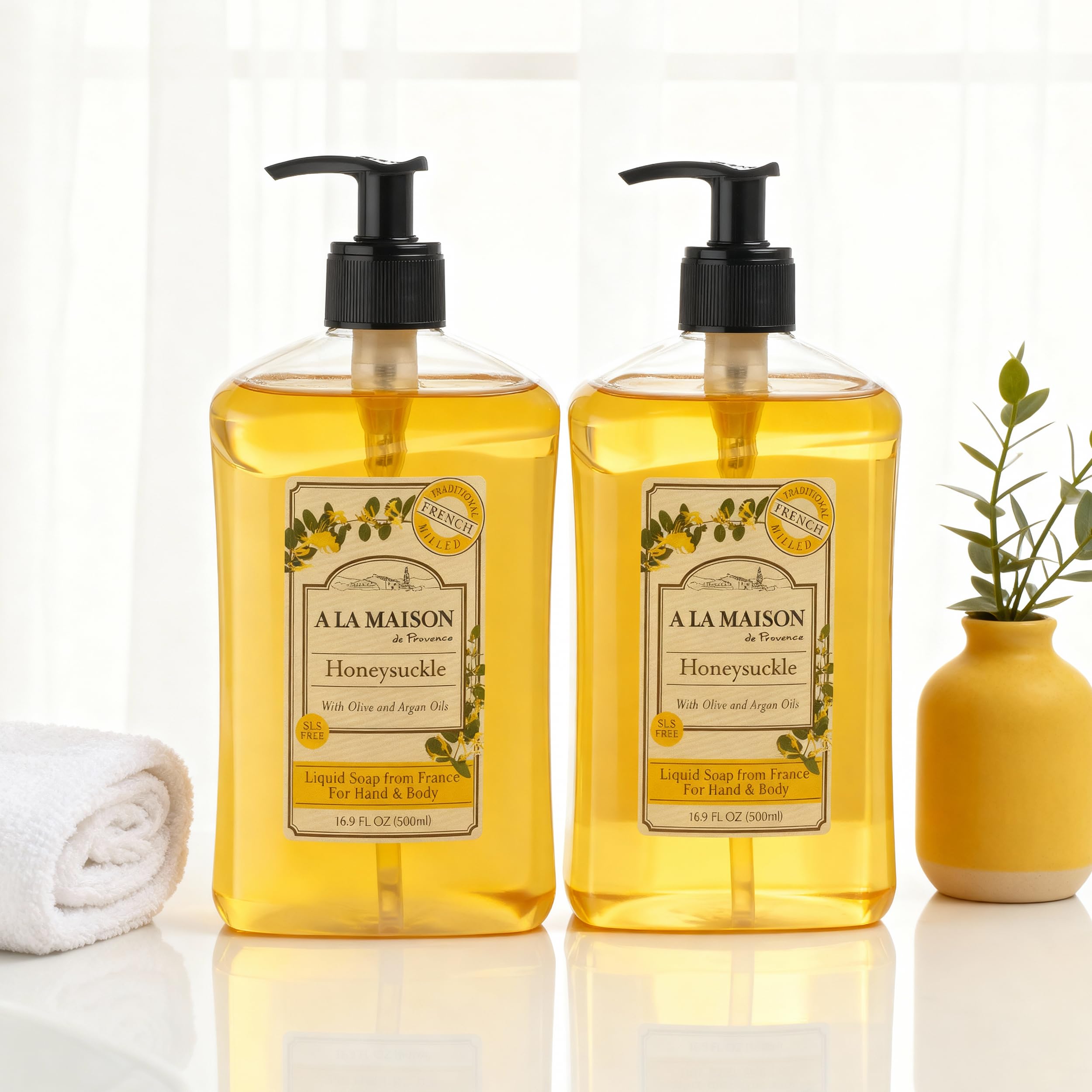A LA MAISON Honeysuckle bottle pour showing smooth lather for daily handwashing.