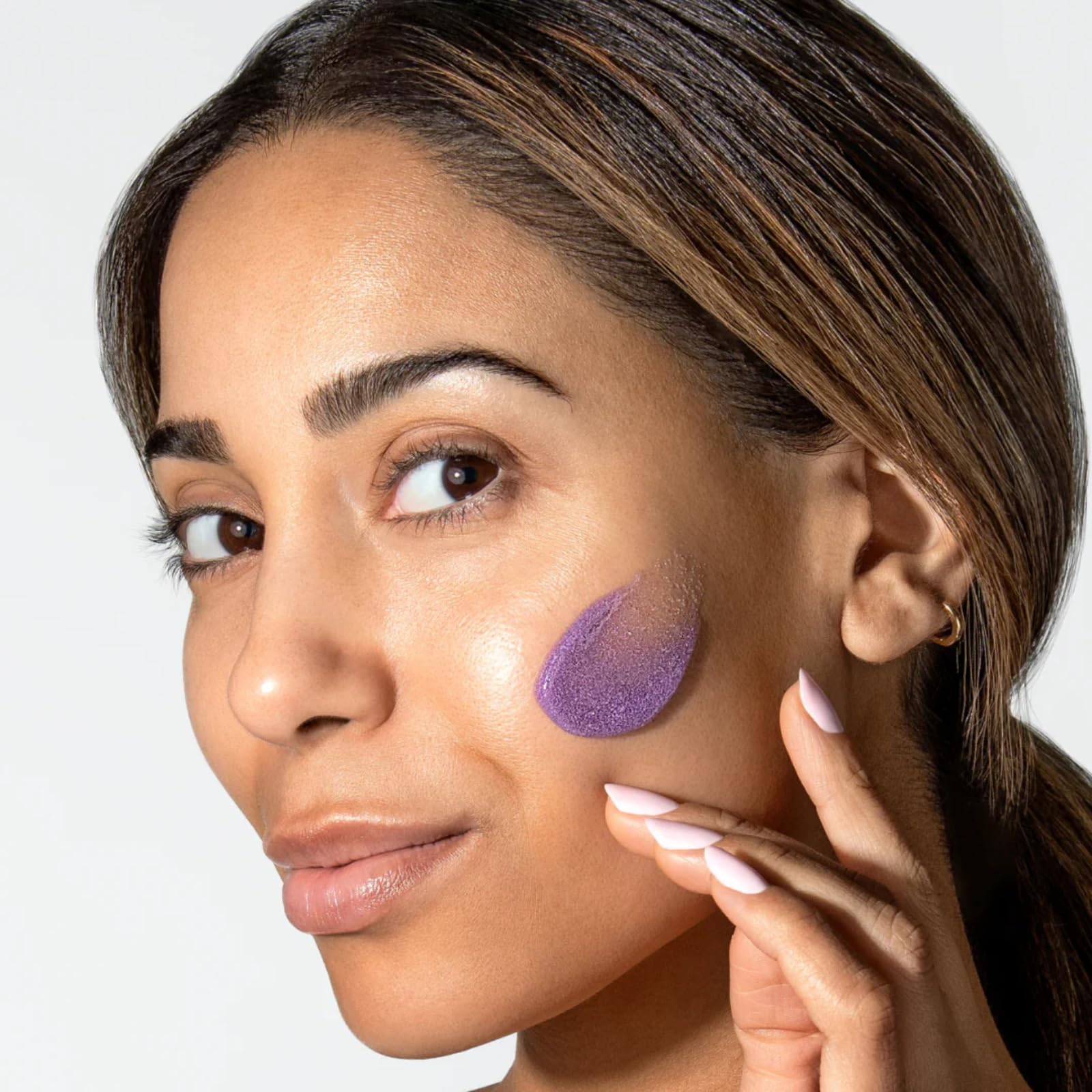ALASTIN ReSURFACE polish sits on vanity for glow routine