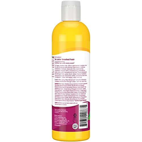 Alba Botanica Colorific Plumeria conditioner being applied to hair for color care.