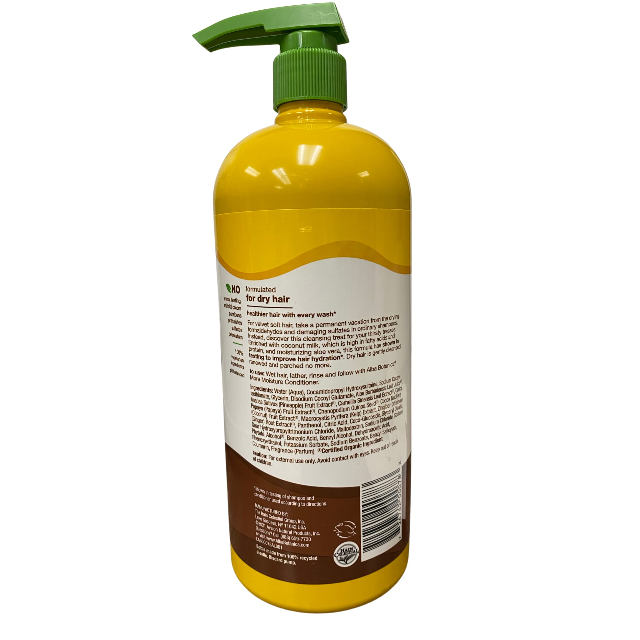 Alba Botanica More Moisture Shampoo label closeup highlighting coconut milk moisture.