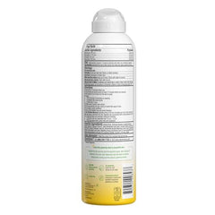 Alba Botanica spray mist applying lightweight sunscreen quickly