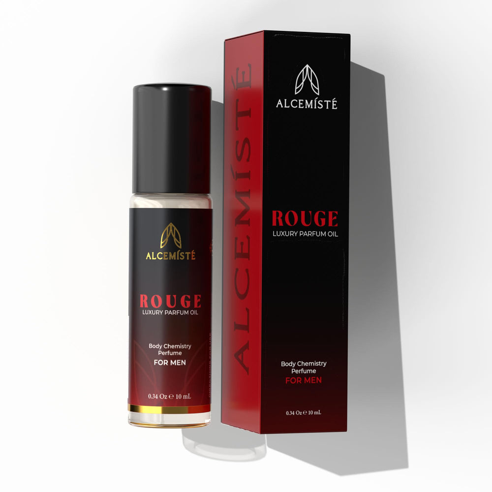 Alcemiste Rouge bottle closeup emphasizes premium pheromone parfum oil for confident presence.
