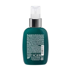 Close-up of Alfaparf Milano reconstruction daily fluid bottle showing premium spray and ease of use