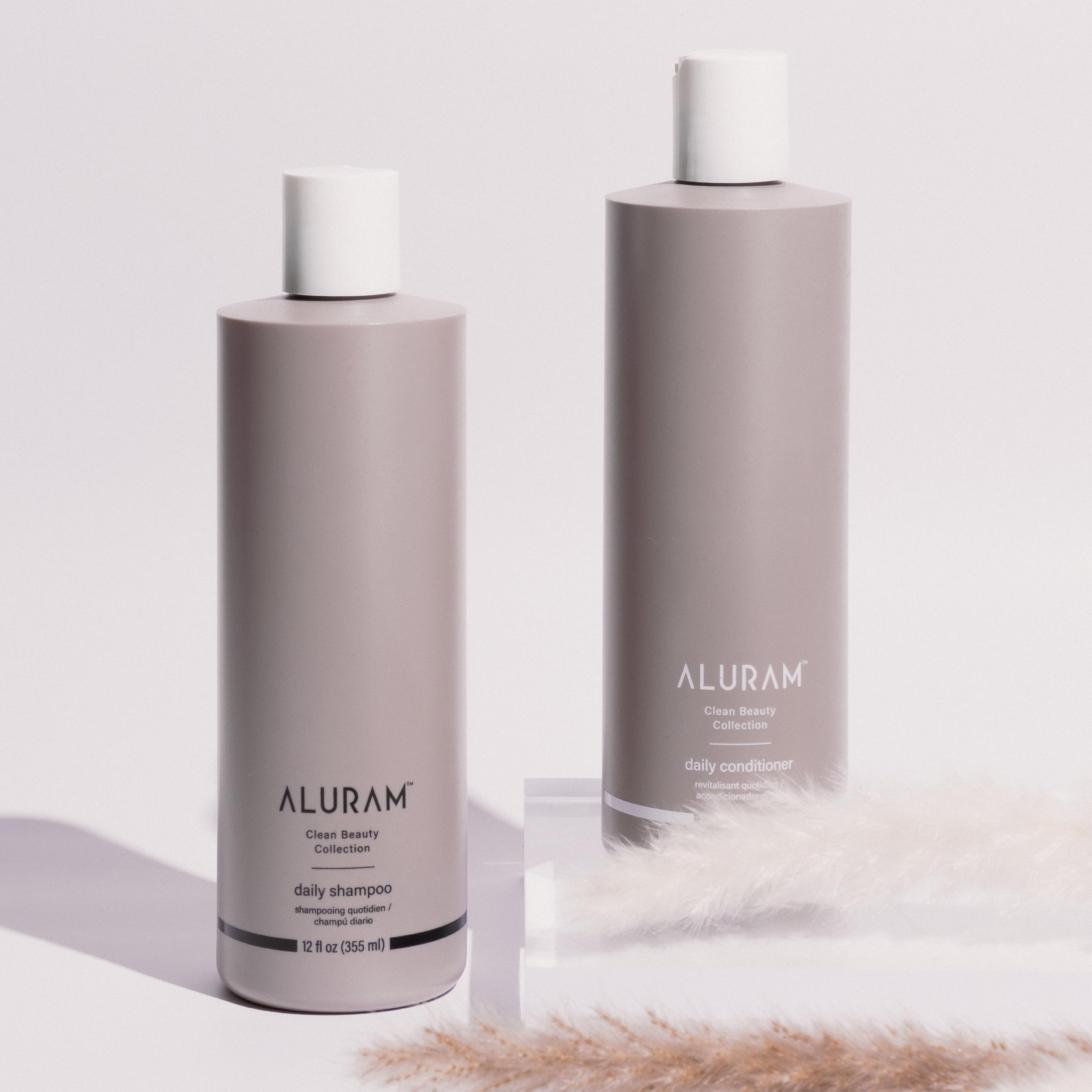 ALURAM Coconut Water Daily Shampoo creamy lather demonstrates cleansing nourishment.