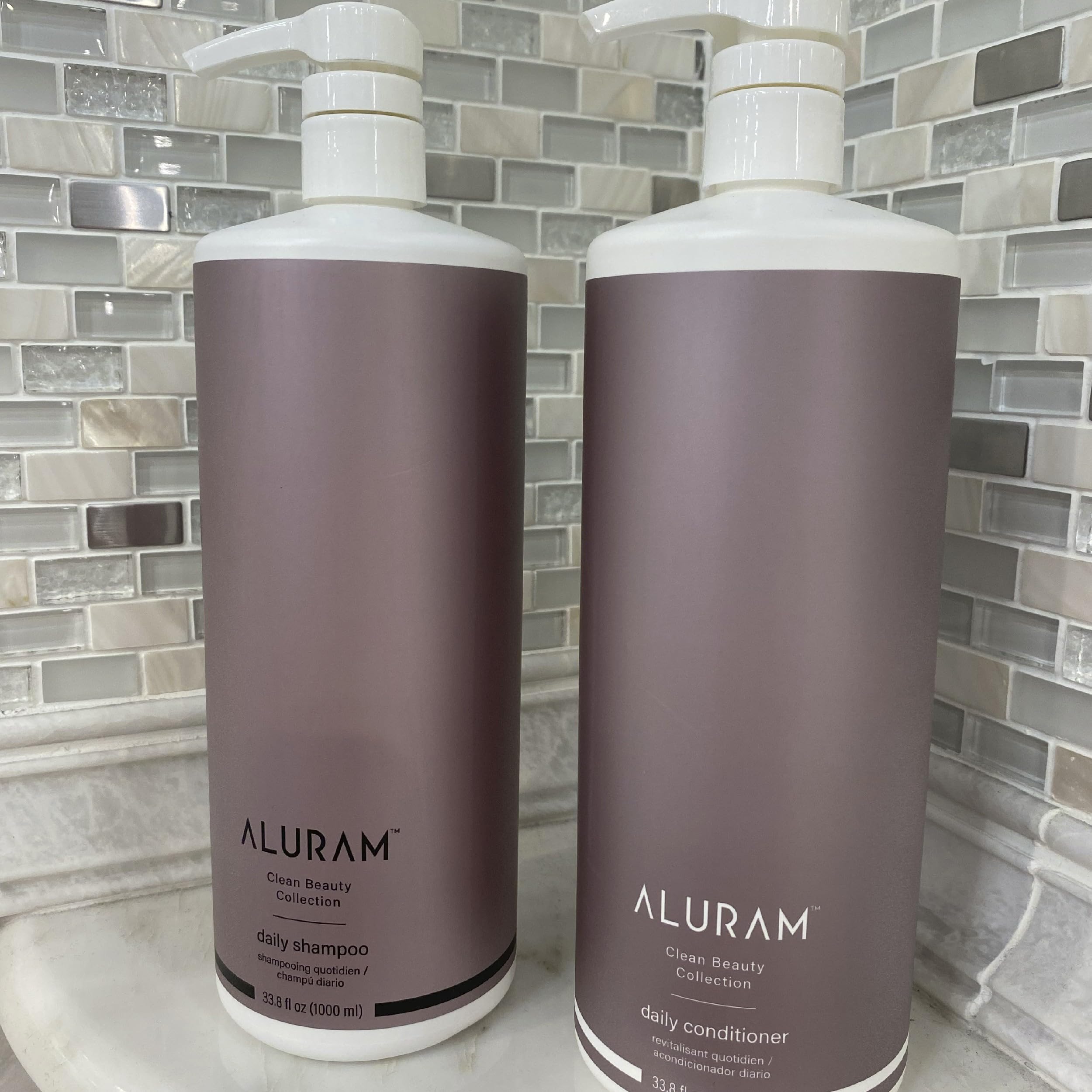 ALURAM Coconut Water Daily Shampoo pump highlighting detoxifying cleanse.
