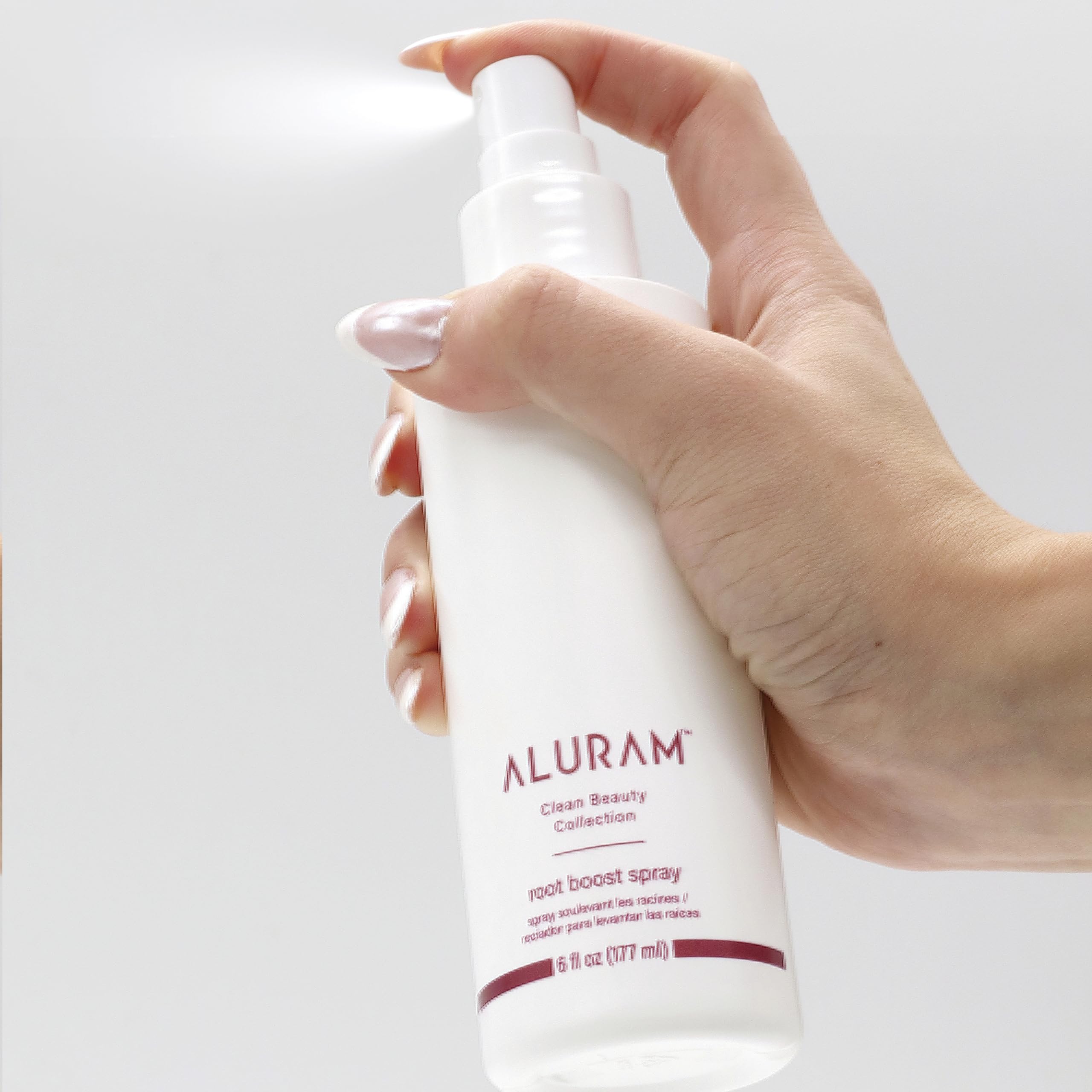 Aplicación en cabello húmedo con ALURAM Root Boost para volumen rápido.