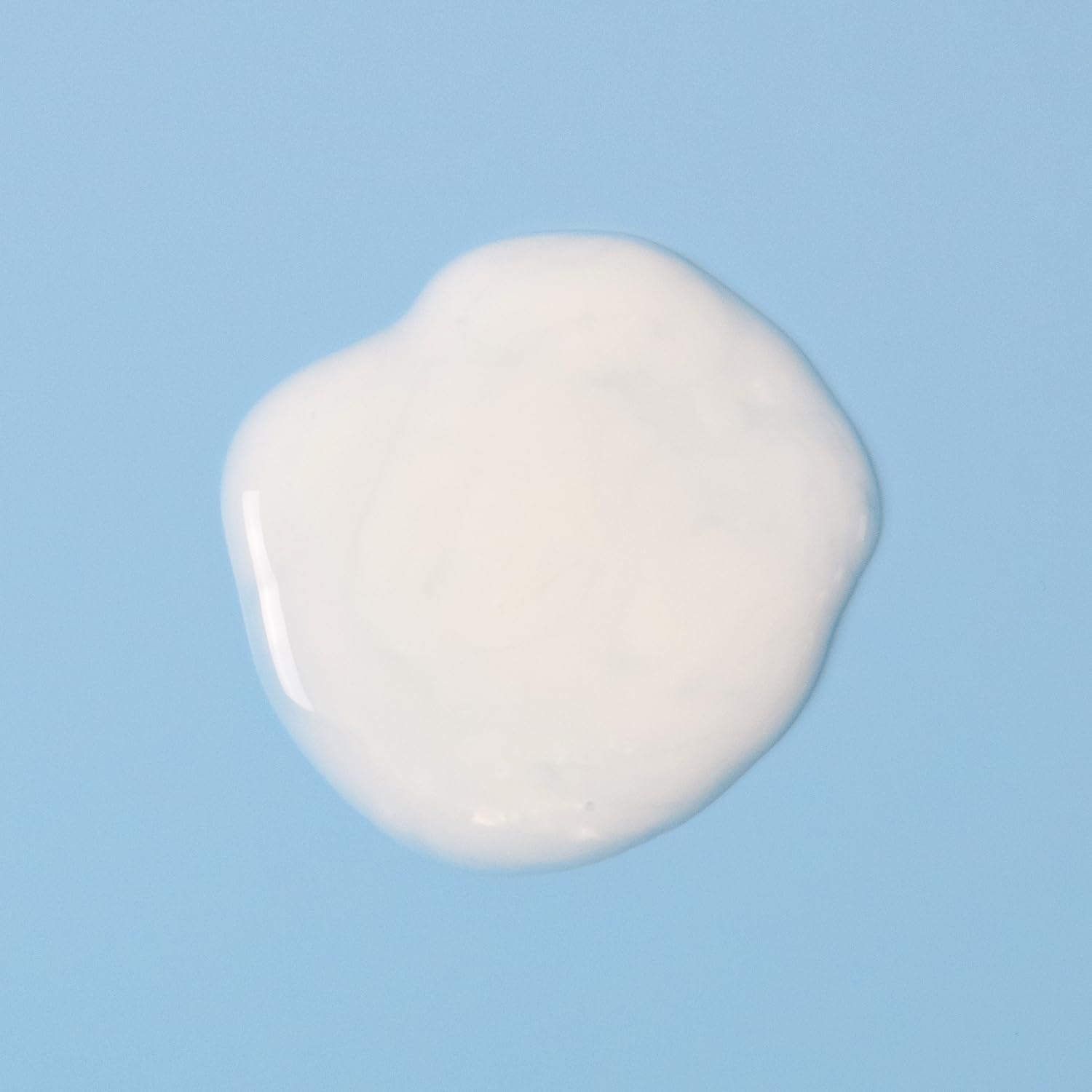 Bottle-side view of Amazon Basics Moisturizing Body Wash showcases nourishing blend with coconut oil and shea butter