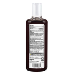 Pouring Amazon Basics tar gel demonstrates easy application to the scalp.