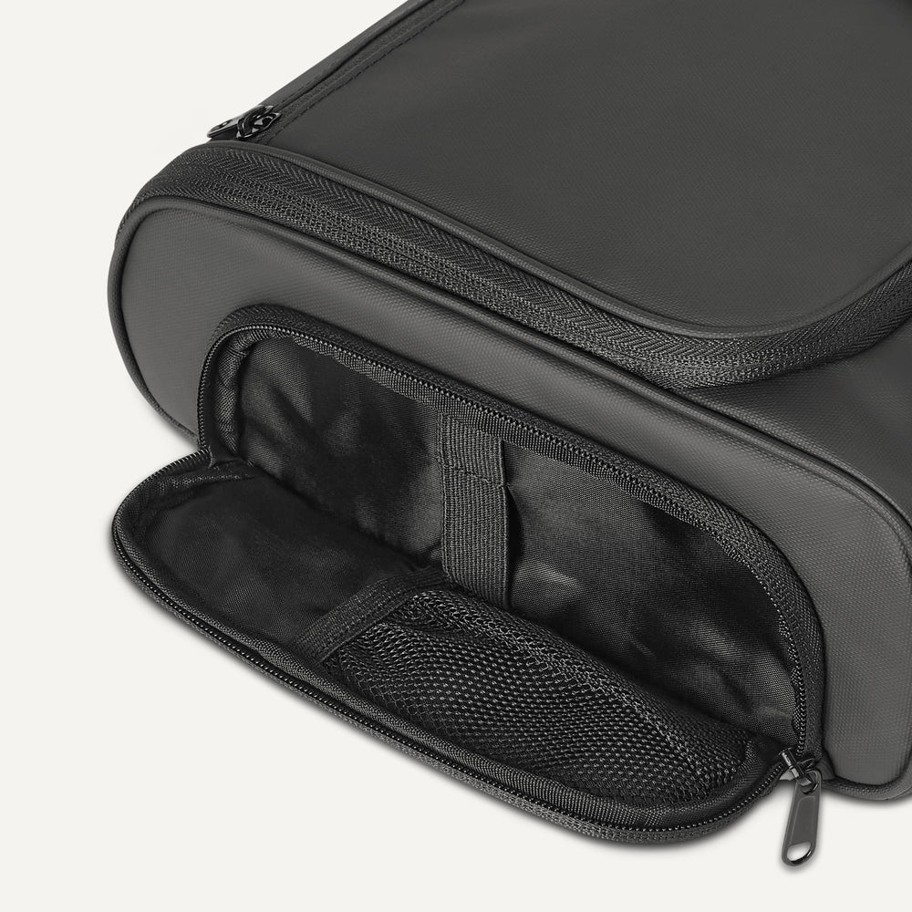 Amazon Essentials hanging travel bag shows mesh interior pockets for quick visibility and air flow.