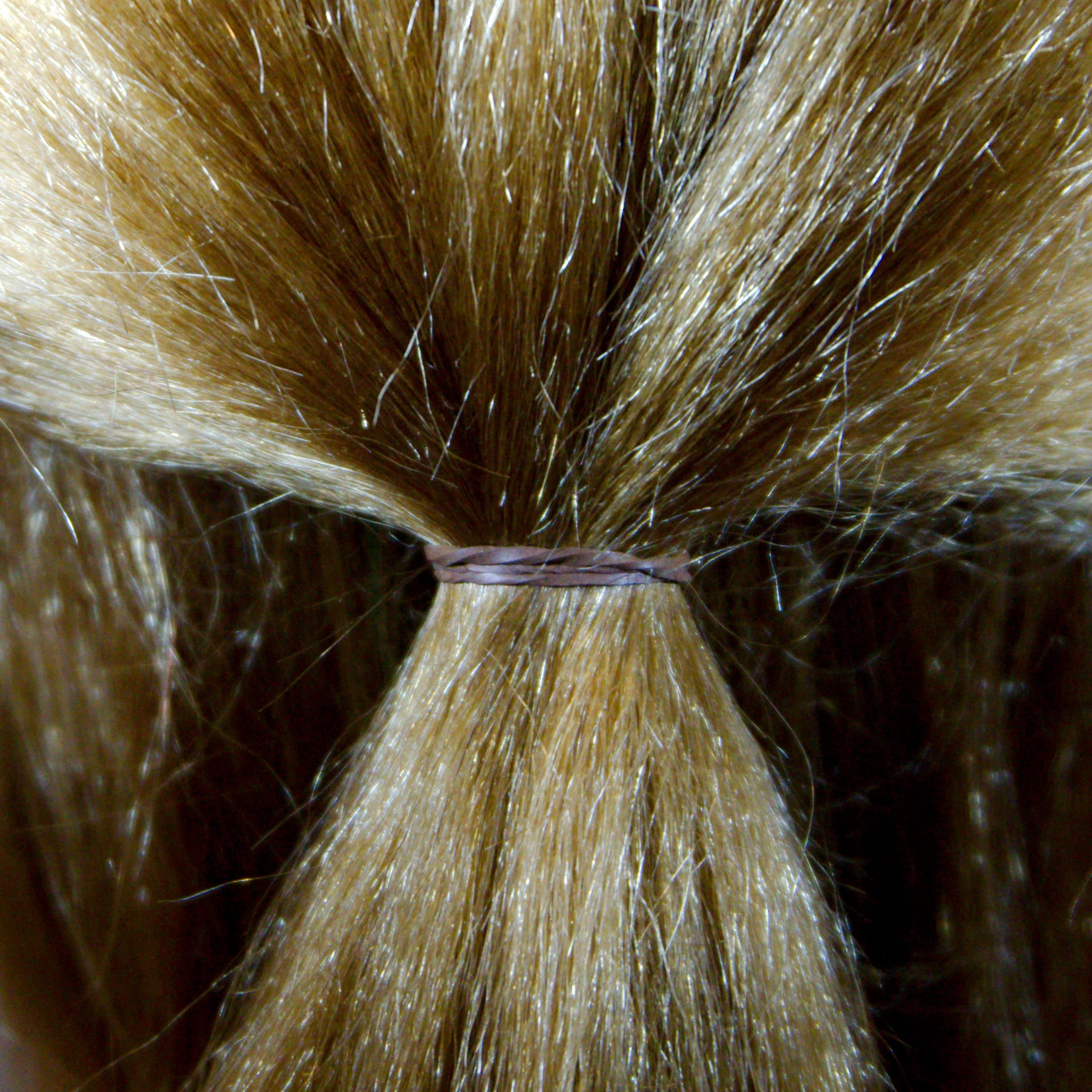 Amelia Beauty braid styling with bands demonstrating precise control and grip