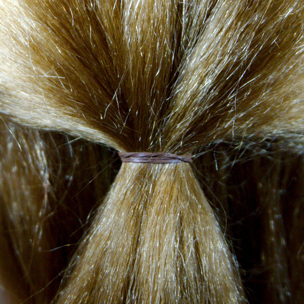 Amelia Beauty braid styling with bands demonstrating precise control and grip