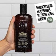 Aplicación en mano: masaje de acondicionador AMERICAN CREW para desenredar sin esfuerzo.