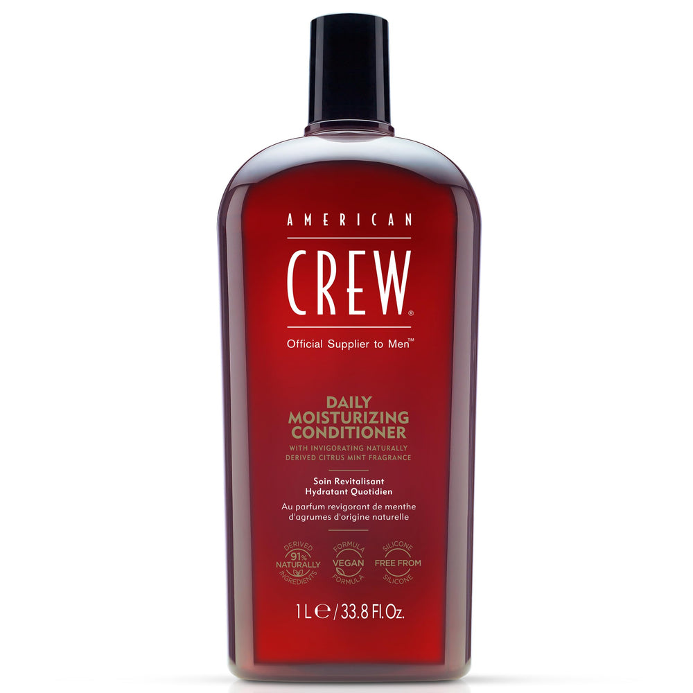 American Crew Daily Moisturizing Conditioner bottle enhances manageability for everyday styling.