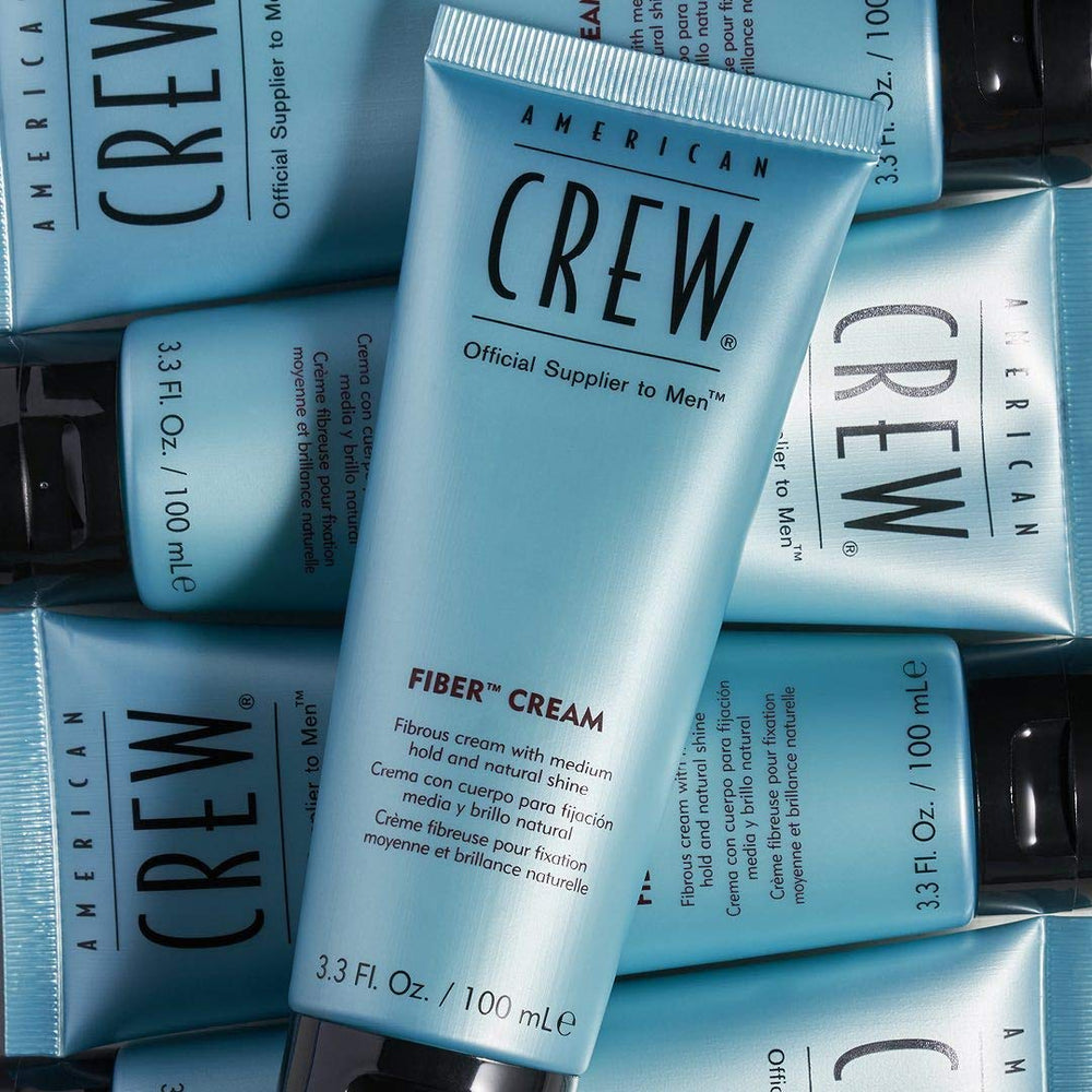 American Crew logo on the fiber cream packaging.