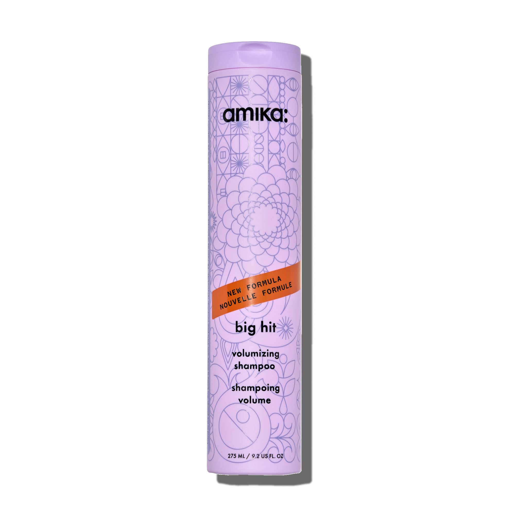 Amika Big Hit shampoo bottle close-up showing sleek packaging for volume.