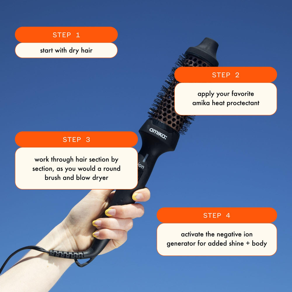 Amika Blowout Babe thermal brush barrel close-up demonstrates ceramic ionic technology for frizz control.