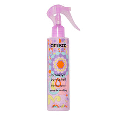 amika Brooklyn Bombshell bottle pour shows effortless application for a quick lift