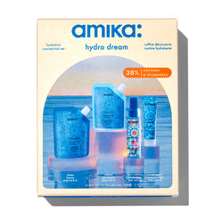 Amika hydro rush shampoo bottle visible, delivers lasting moisture and a gentle cleanse.