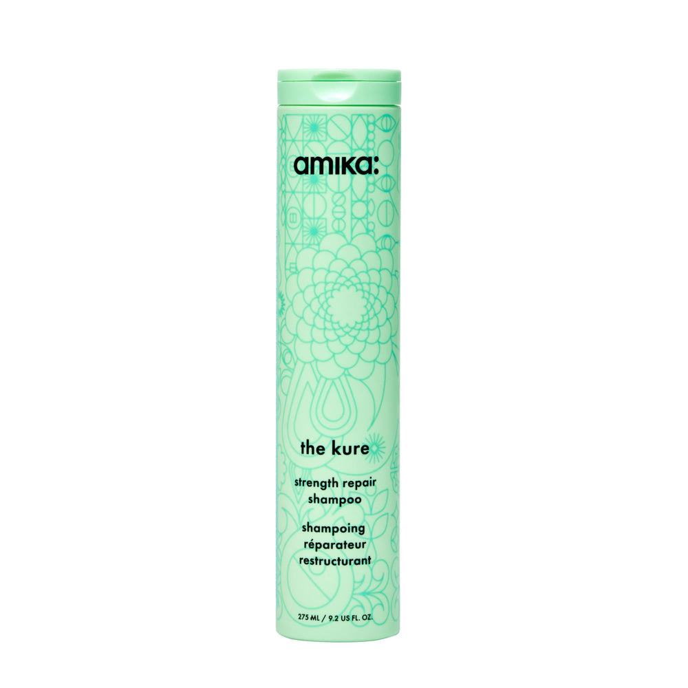 Amika Kure Strength Repair Shampoo bottle with bond fortifying technology