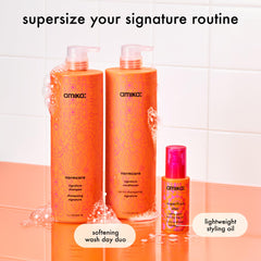 Amika Normcore jumbo conditioner bottle delivering weightless hydration and softness.