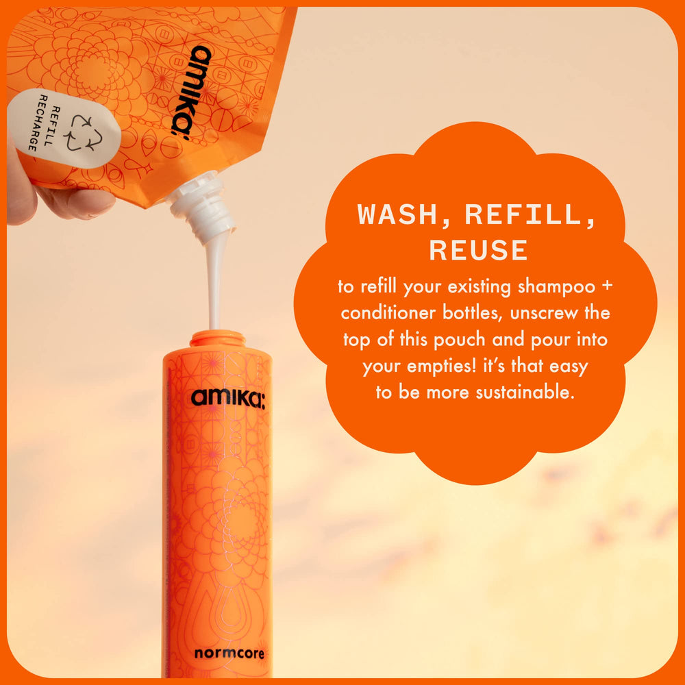 Amika Normcore Signature Shampoo angled bottle conveys easy daily use