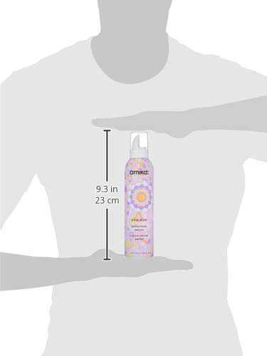 Amika mousse delivering lightweight hydration without weighing hair down.